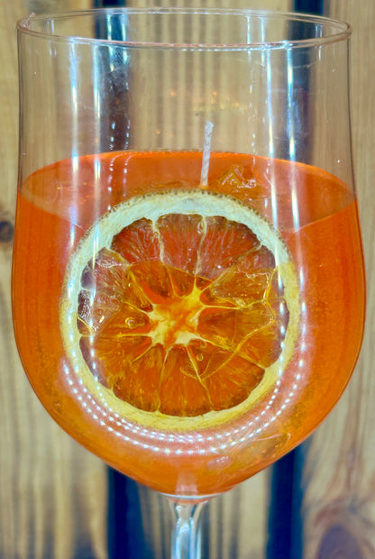 Feierliche Orangen Getränk Kerze