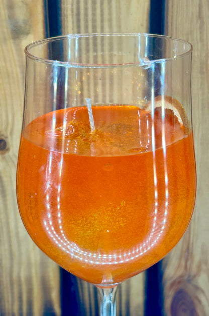 Feierliche Orangen Getränk Kerze