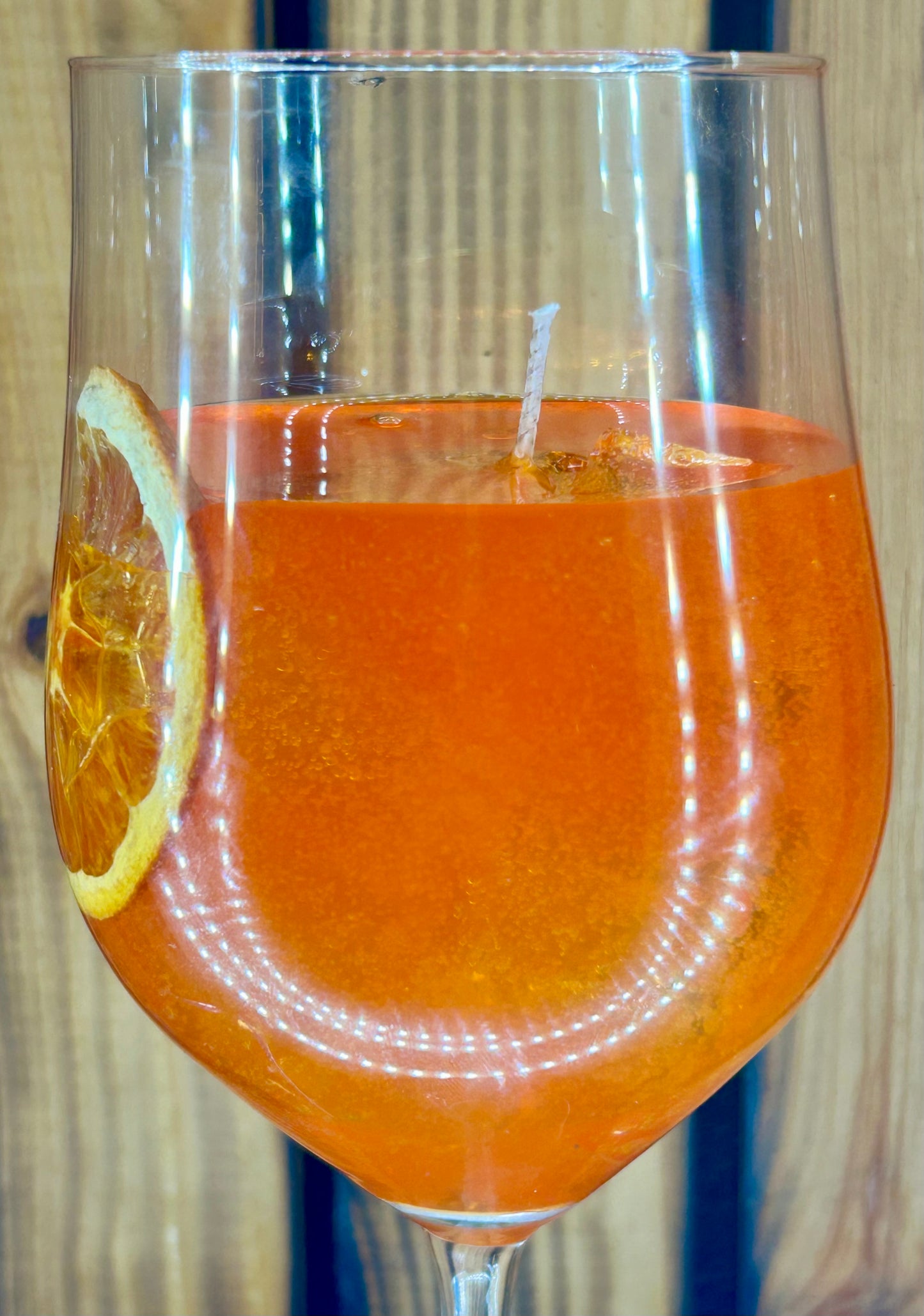 Feierliche Orangen Getränk Kerze