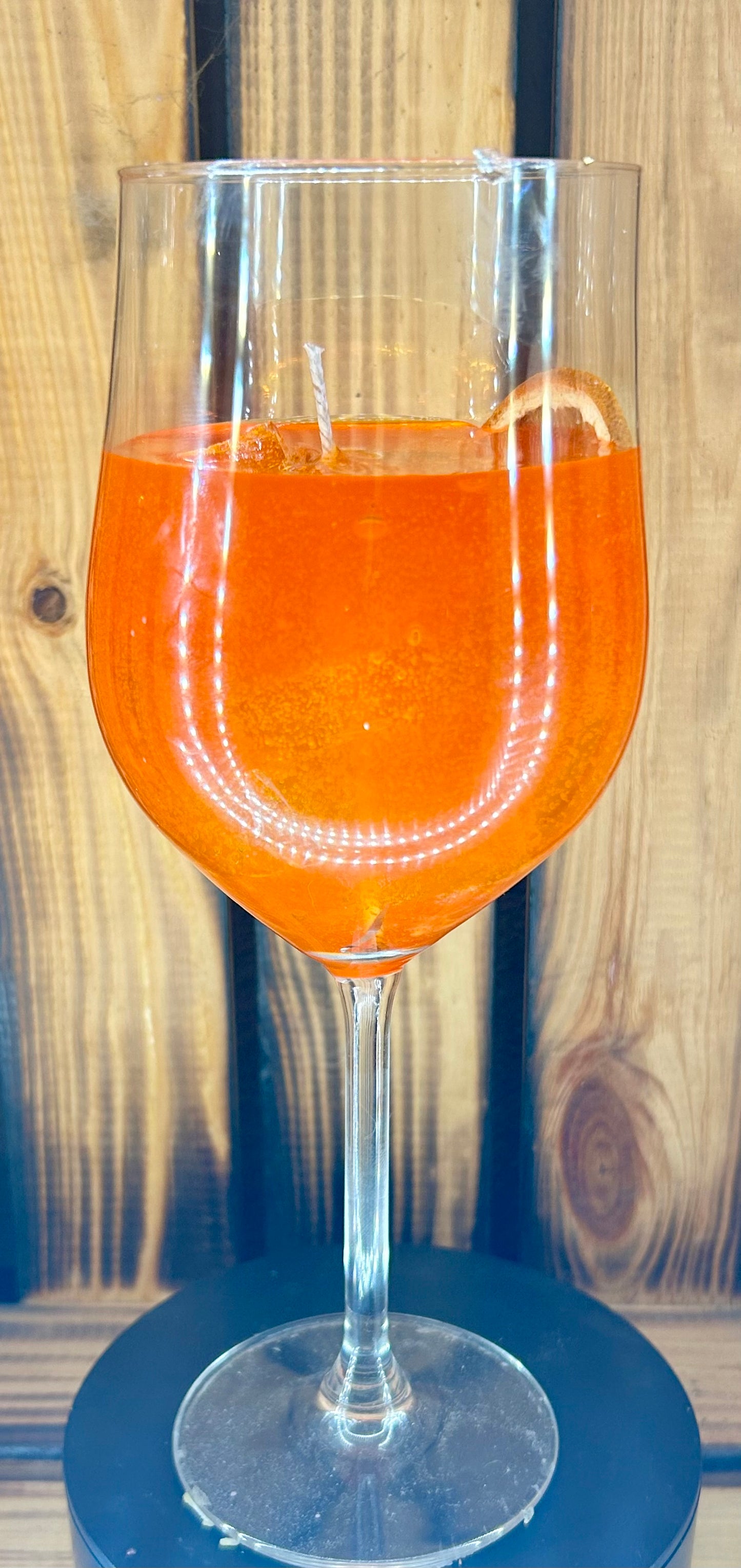 Feierliche Orangen Getränk Kerze