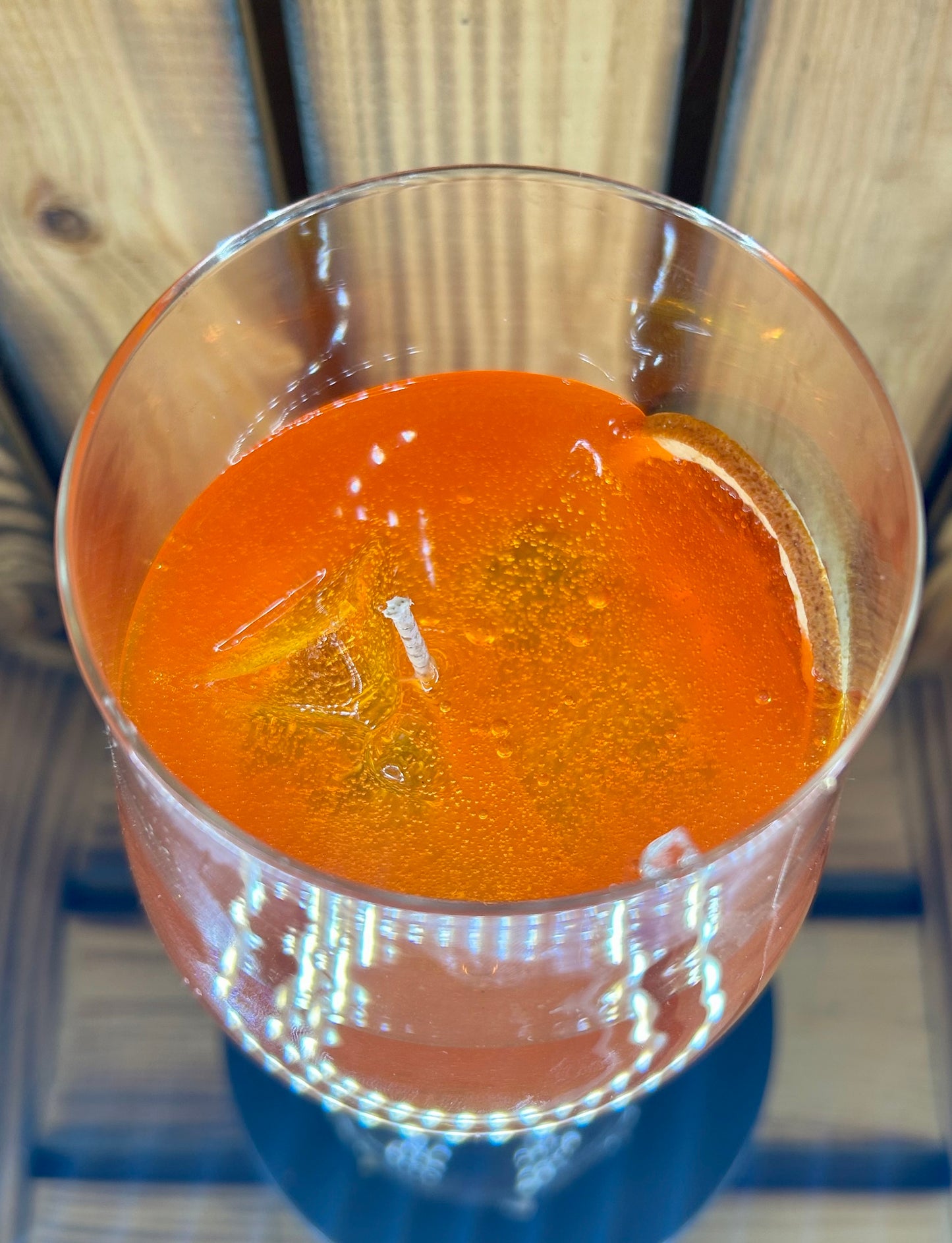 Feierliche Orangen Getränk Kerze